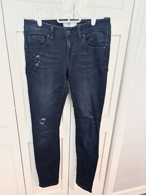 CAbi Women's Blue Skinny Jeans with Subtle Distressing